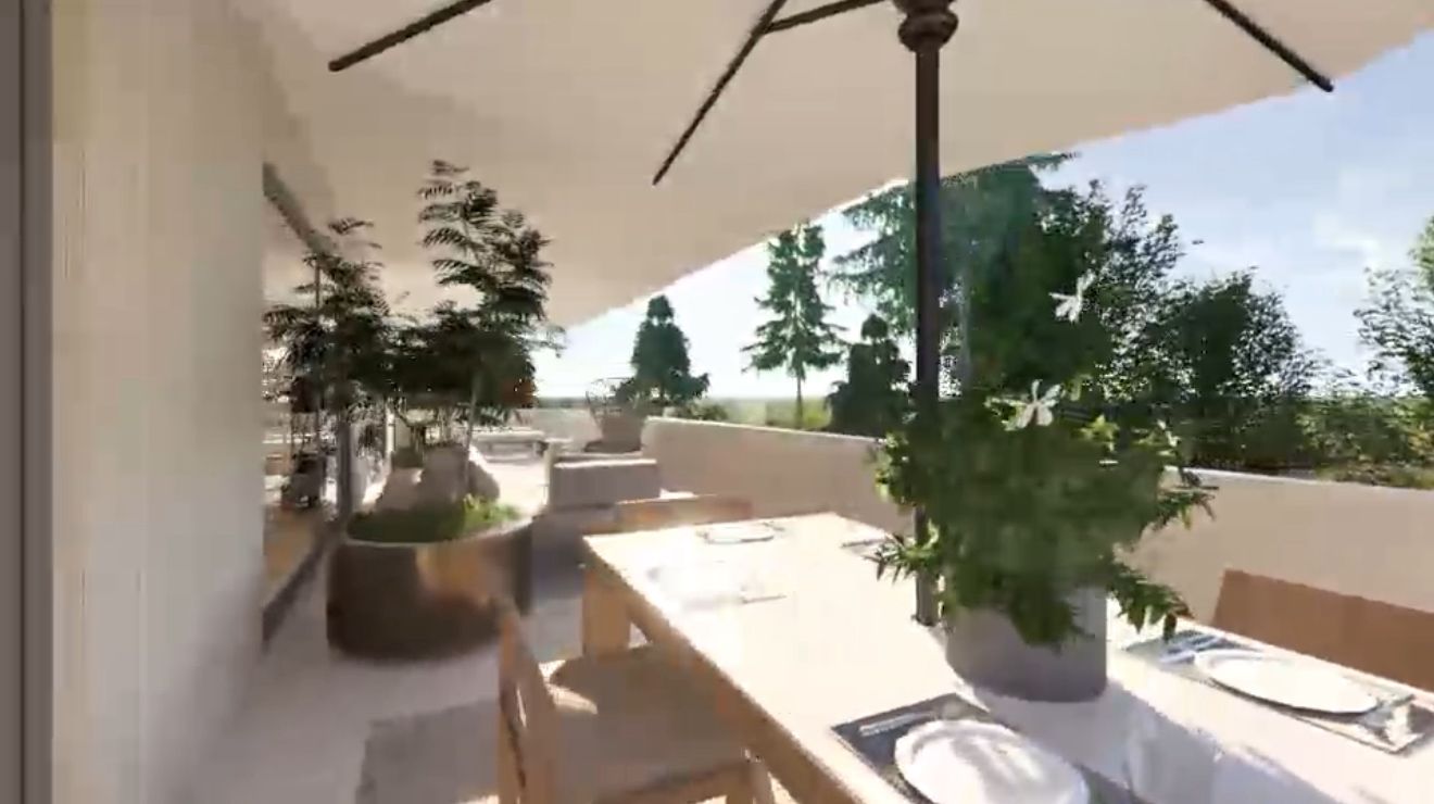 Planted terrace with outdoor dining table and sea horizon